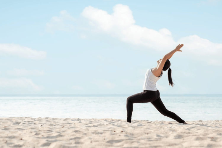 Enjoy a yoga session on the beach.