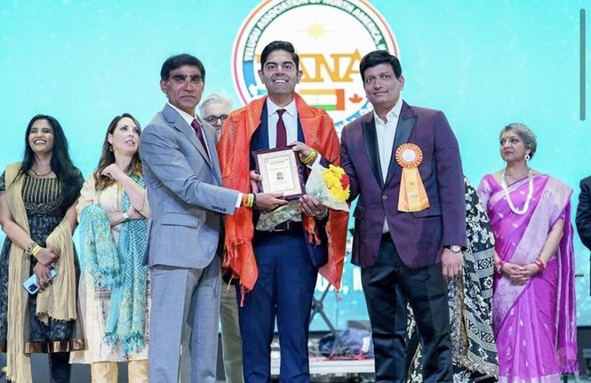 Democratic Leader Ranjeev Puri being awarded on stage at the Telugu Association of North America Conference. Democratic Leader Ranjeev Puri being awarded on stage at the Telugu Association of North America Conference.