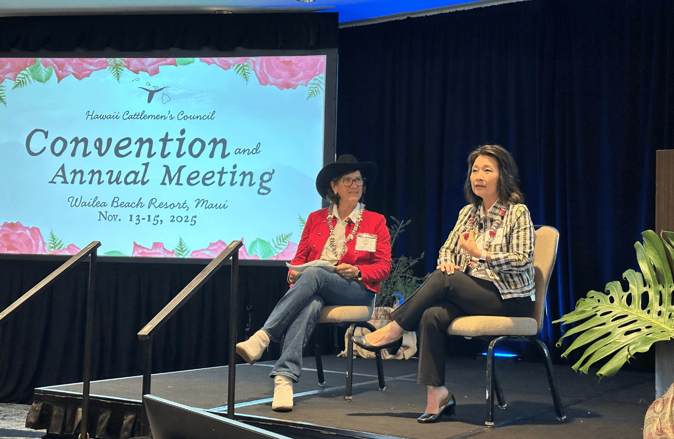 Lt. Gov. Sylvia Luke and a woman speaking while sitting on stage. 