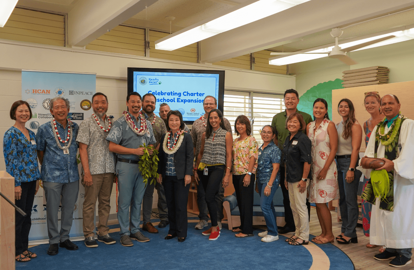 Lt. Gov. Sylvia Luke, legislator, and education leaders, smiling for a group photo in a Ready Keiki classroom. 