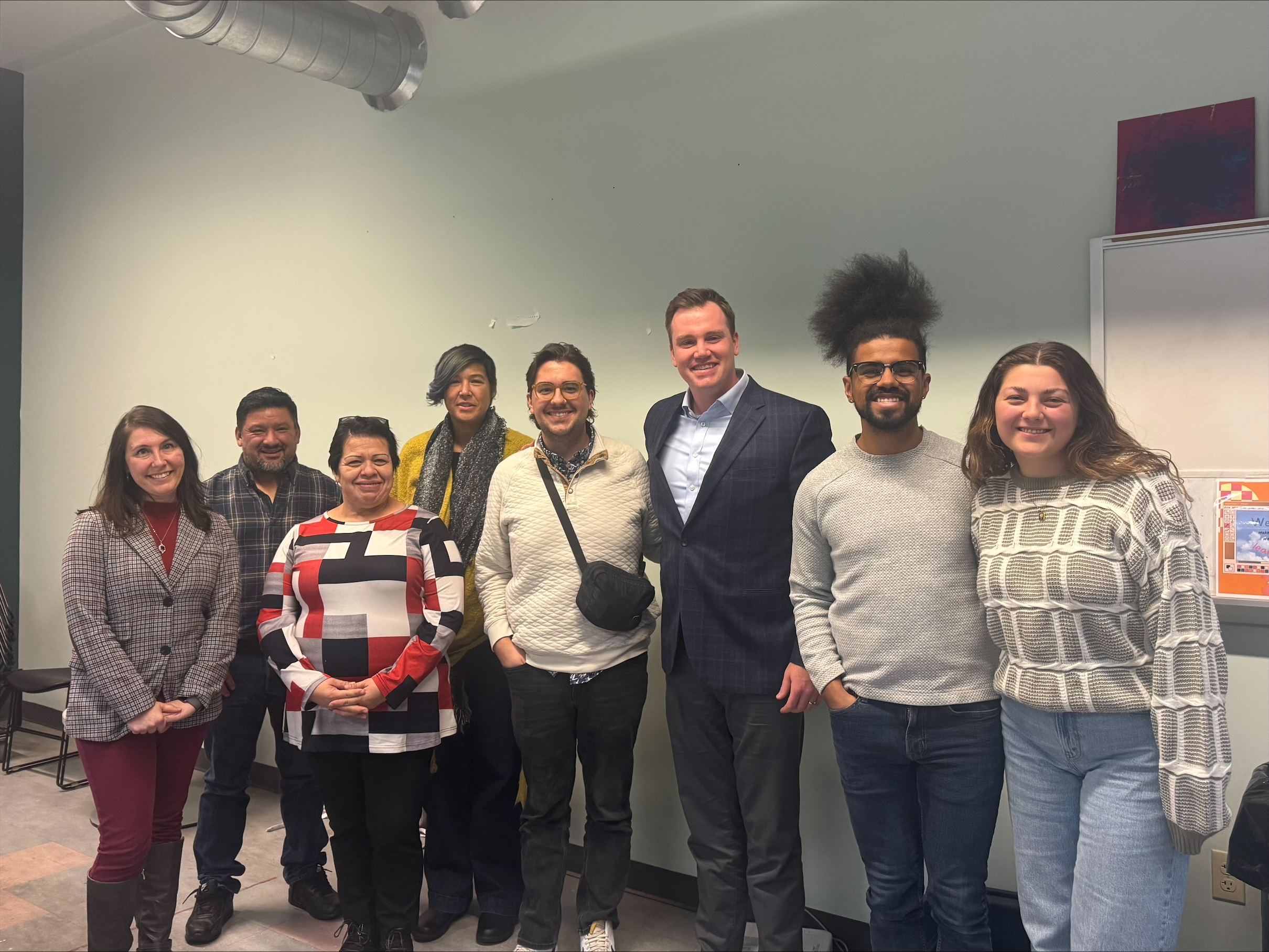State Rep. John Fitzgerald posing for a photo with community members at his community conversation in December 2025. State Rep. John Fitzgerald posing for a photo with community members at his community conversation in December 2025.