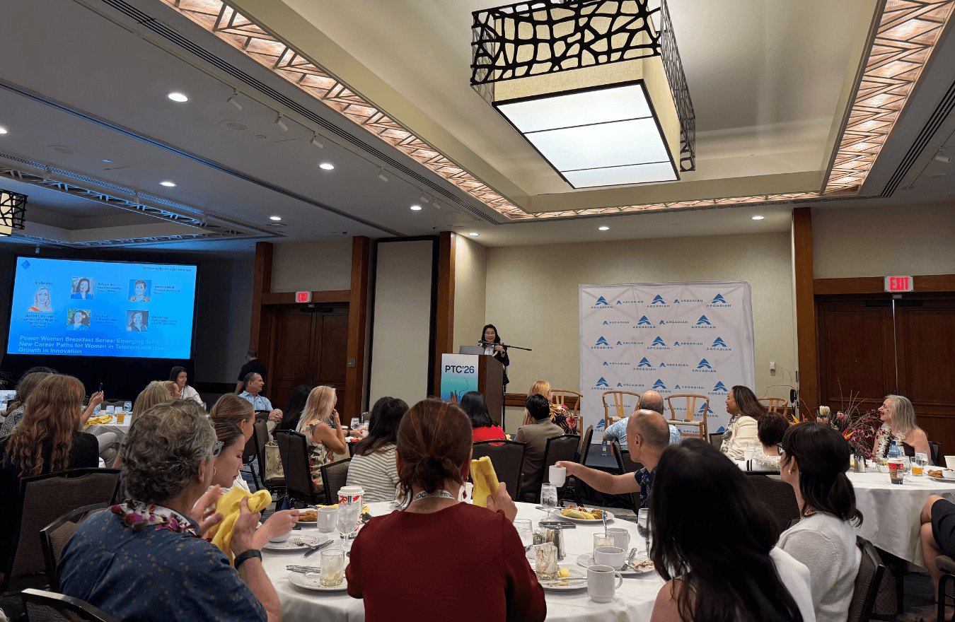 Lt. Gov. Sylvia Luke speaking while standing at a podium in front of a large group sitting down. 