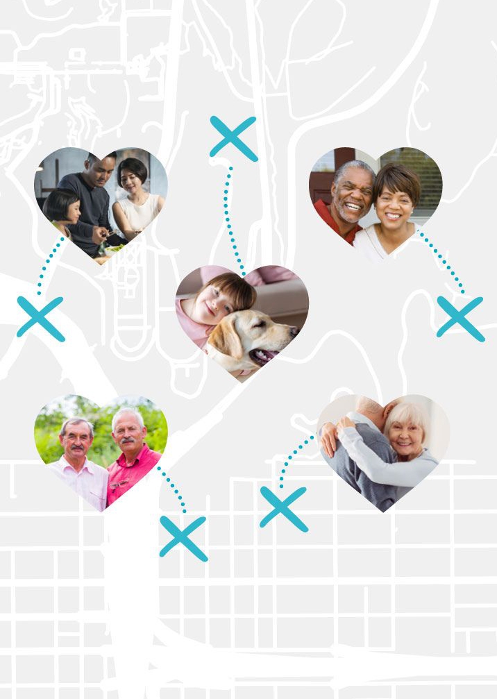 Volunteers walking in front of a house.