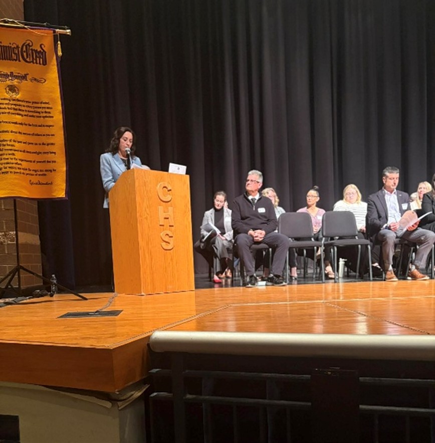 Michigan State Representative Angela Witwer speaking on stage at the Charlotte Optimist Club Youth Appreciation event. Michigan State Representative Angela Witwer speaking on stage at the Charlotte Optimist Club Youth Appreciation event.