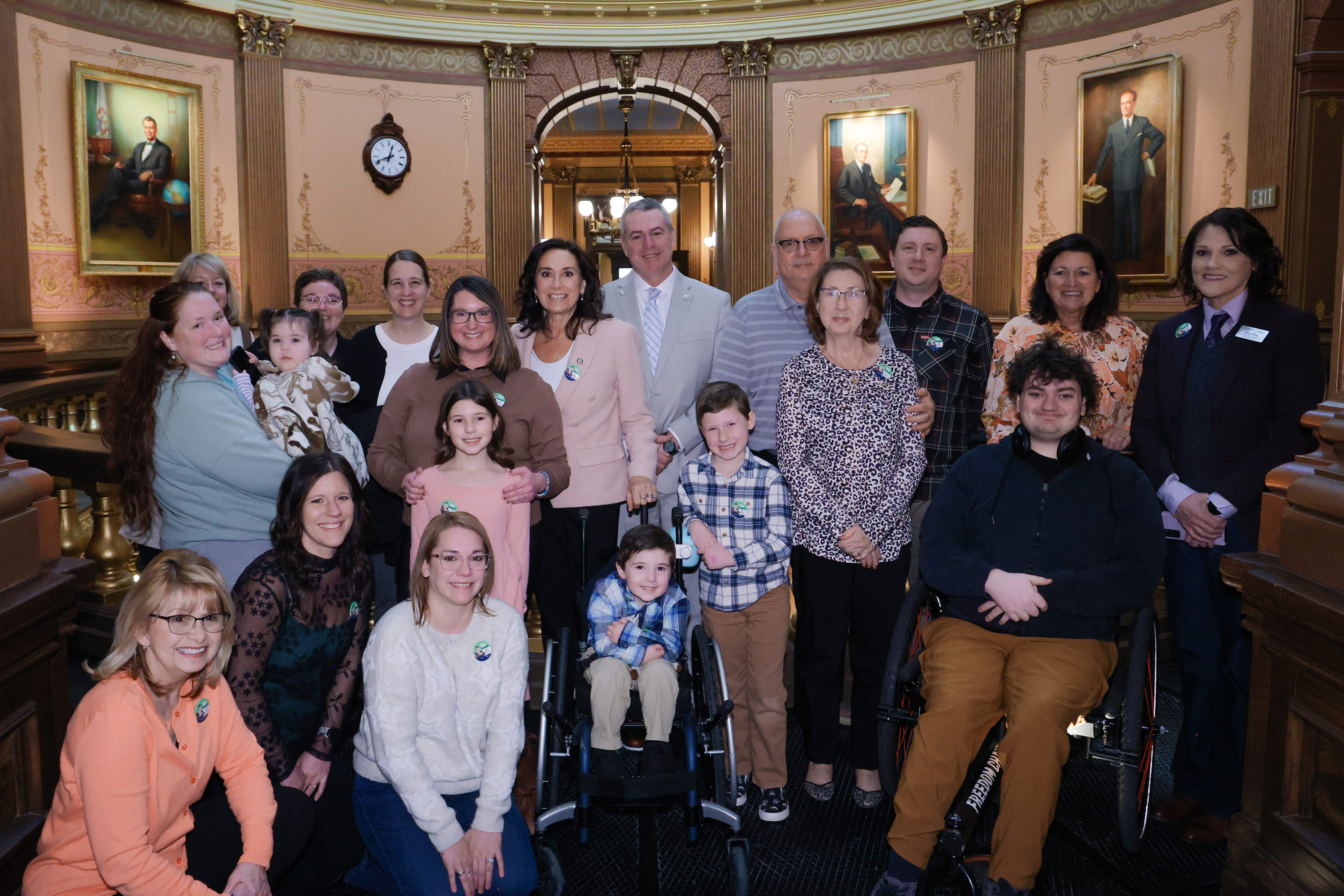 Michigan State Representatives Angela Witwer and Mike Mueller with the Majewski family and other constituents in the Michigan Capitol Building. Michigan State Representatives Angela Witwer and Mike Mueller with the Majewski family and other constituents in the Michigan Capitol Building.