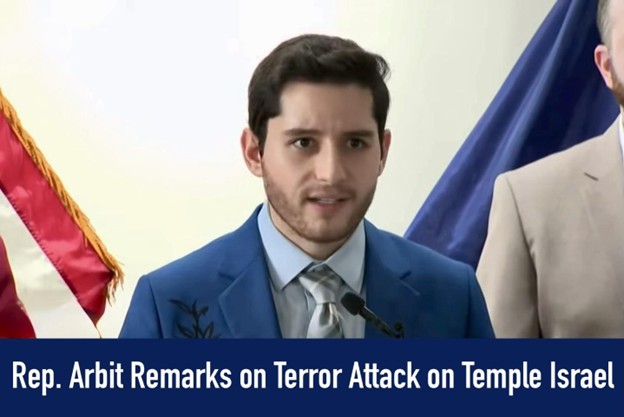 Below and image of state Representative Noah Arbit, text on a news banner reads "Rep. Arbit Remarks on Terror Attack on Temple Israel. Below and image of state Representative Noah Arbit, text on a news banner reads "Rep. Arbit Remarks on Terror Attack on Temple Israel.