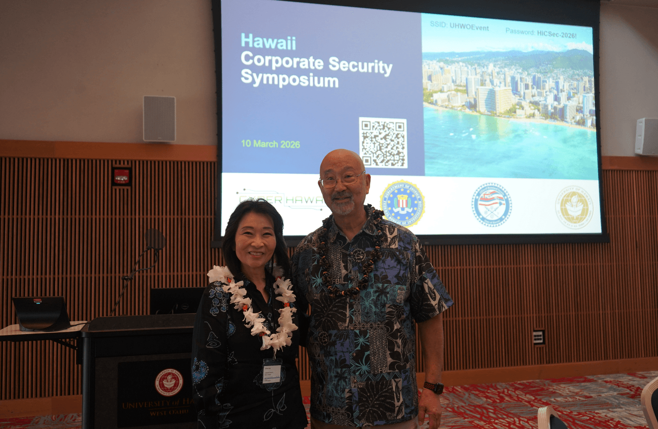 Lt. Gov. Sylvia Luke and man smiling for a photo. 
