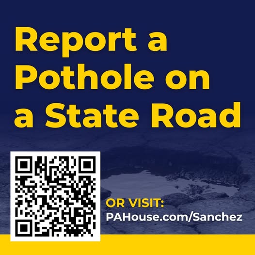 Gina raising her hand to take the oath to become a notary public.