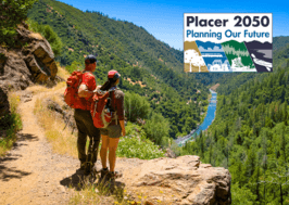 Hikers in the American River overlook with the Placer 2050 logo