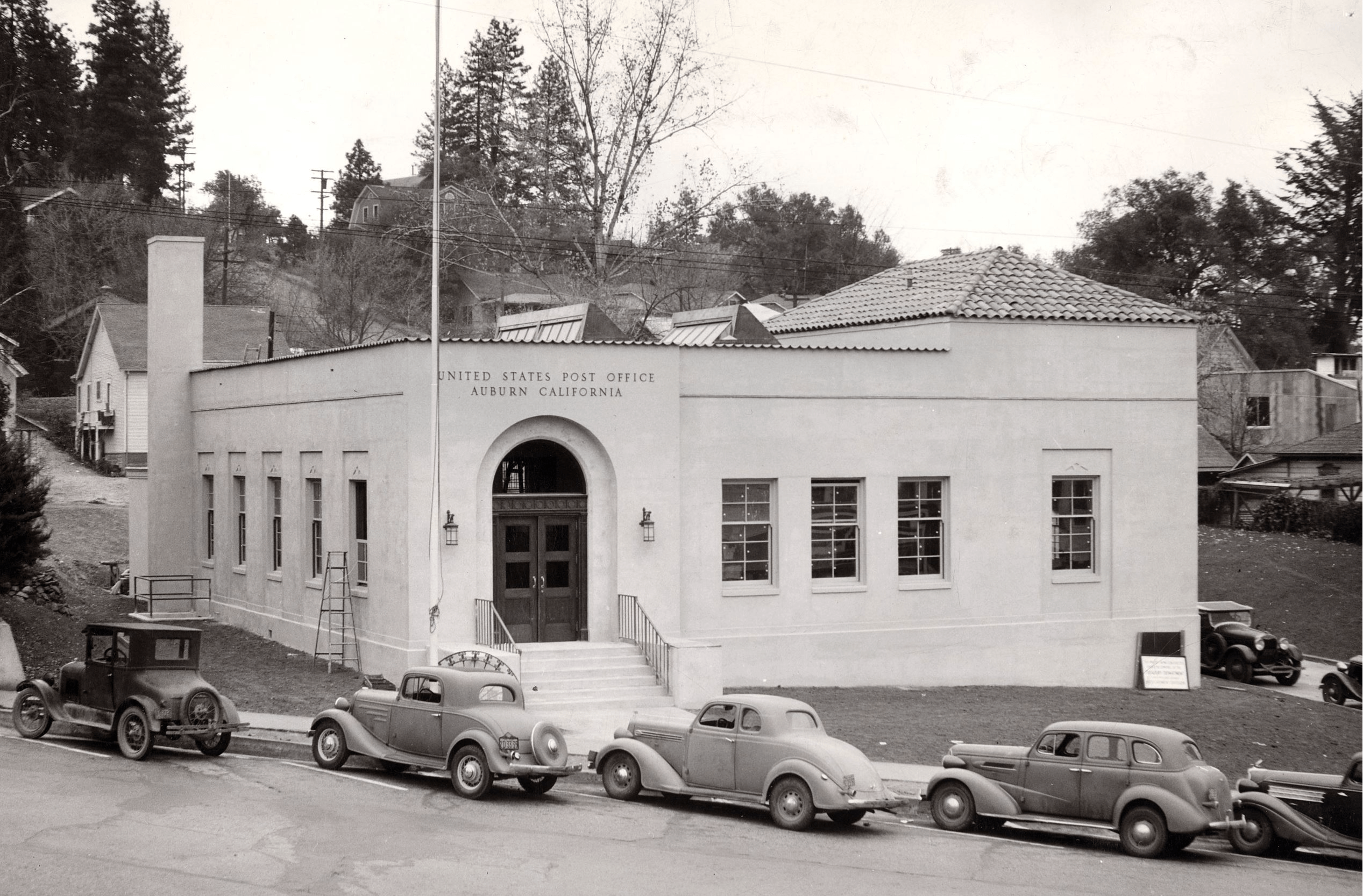 A black and white historic photo of an old United States Post Office located in Auburn, California.