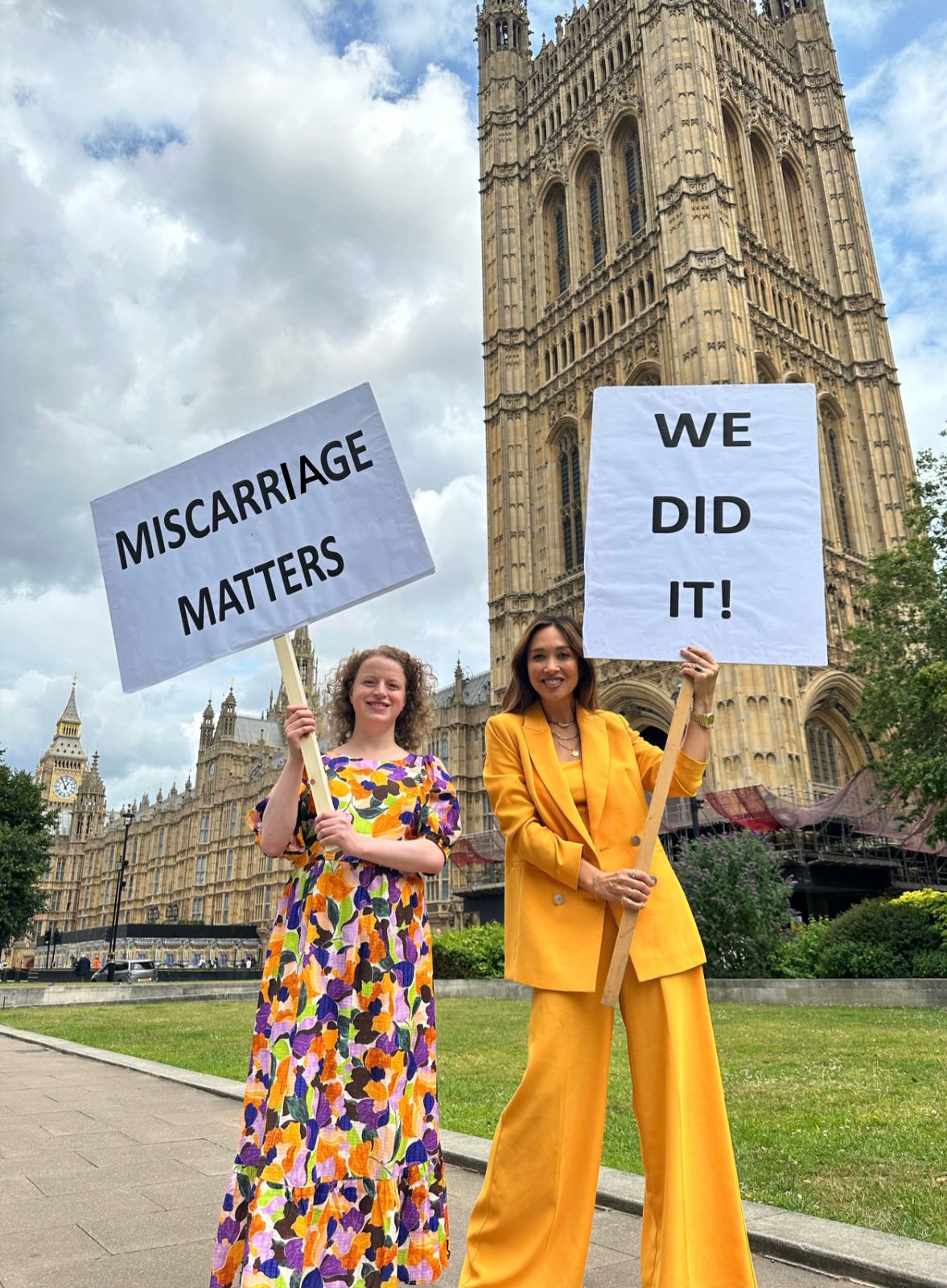 Olivia with Myleene Klass outside Parliament holding placards Olivia with Myleene Klass outside Parliament holding placards