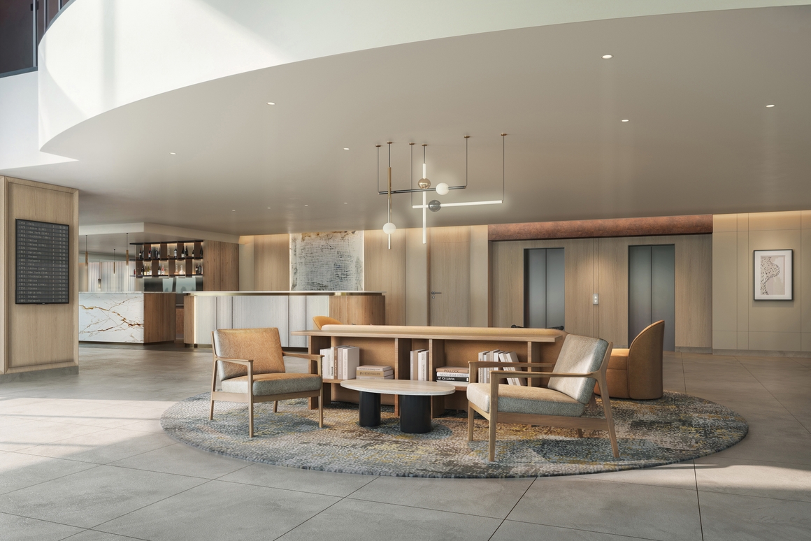 Lobby with rug and seating area at AC Hotel Birmingham NEC & Airport