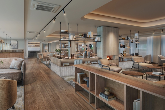 View into the restaurant, stylish seating and breakfast buffet in the background 