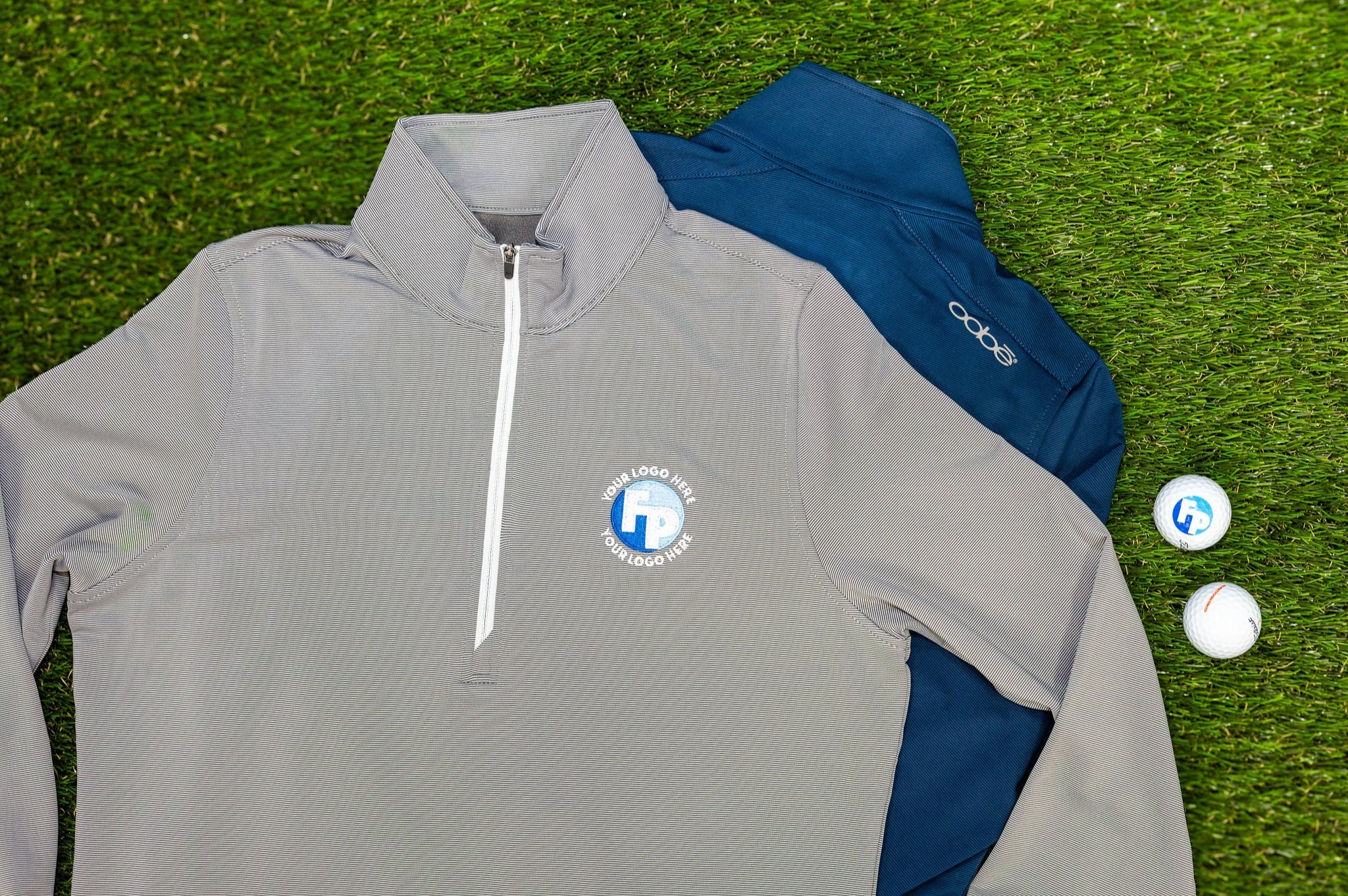 A grey Fully Promoted branded sweater for golf players.