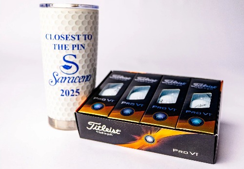 A reusable water bottle with a screen printed on logo and a pack of golf balls.