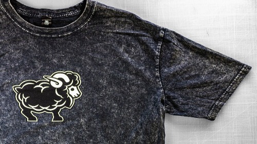 Grey t-shirt with the Misfit Media Logo screen printed on.