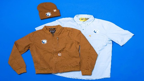 A brown Carhartt Jacket and a Light Blue Carhartt Shirt with a Brown Carhartt Beanie, all with the Fully Promoted logo embroirdered on.