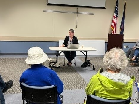 Michigan State Representative Betsy Coffia speaking to constituents at her office hour event. Michigan State Representative Betsy Coffia speaking to constituents at her office hour event.
