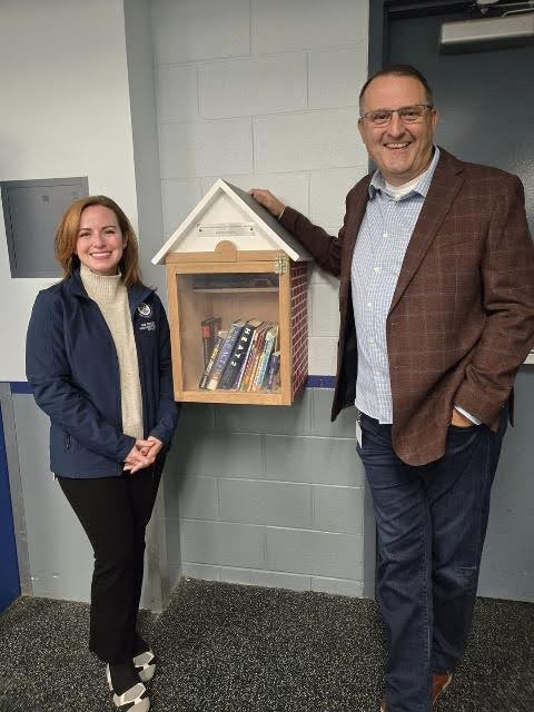 Michigan State Representative Erin Byrnes stands next to her donated little free library with Sean Fletcher, Dearborn’s Director of Parks and Recreation. Michigan State Representative Erin Byrnes stands next to her donated little free library with Sean Fletcher, Dearborn’s Director of Parks and Recreation.