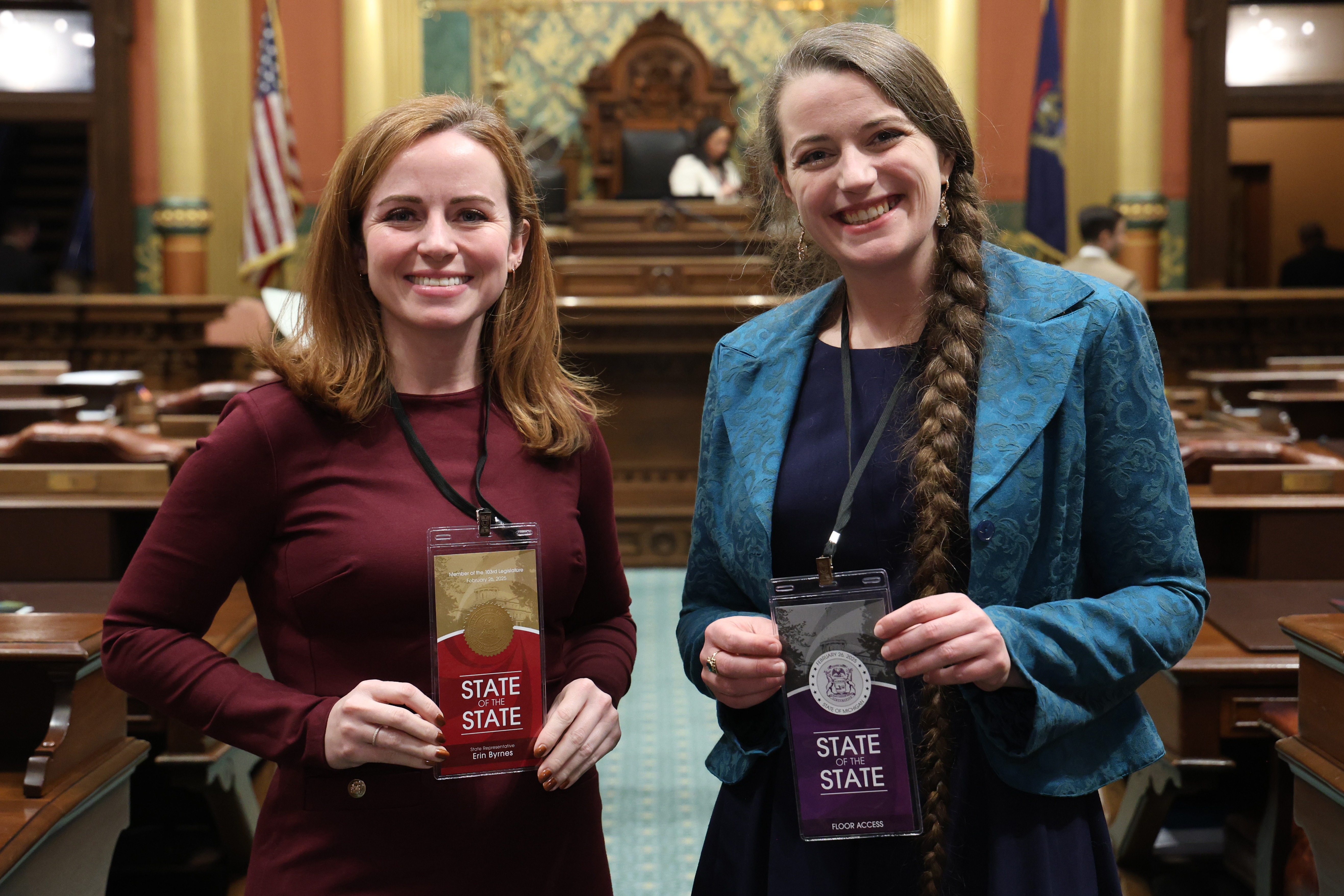 Rep. Byrnes and Betty Adams stand on the floor of the Michigan House of Representatives chamber. Rep. Byrnes and Betty Adams stand on the floor of the Michigan House of Representatives chamber.