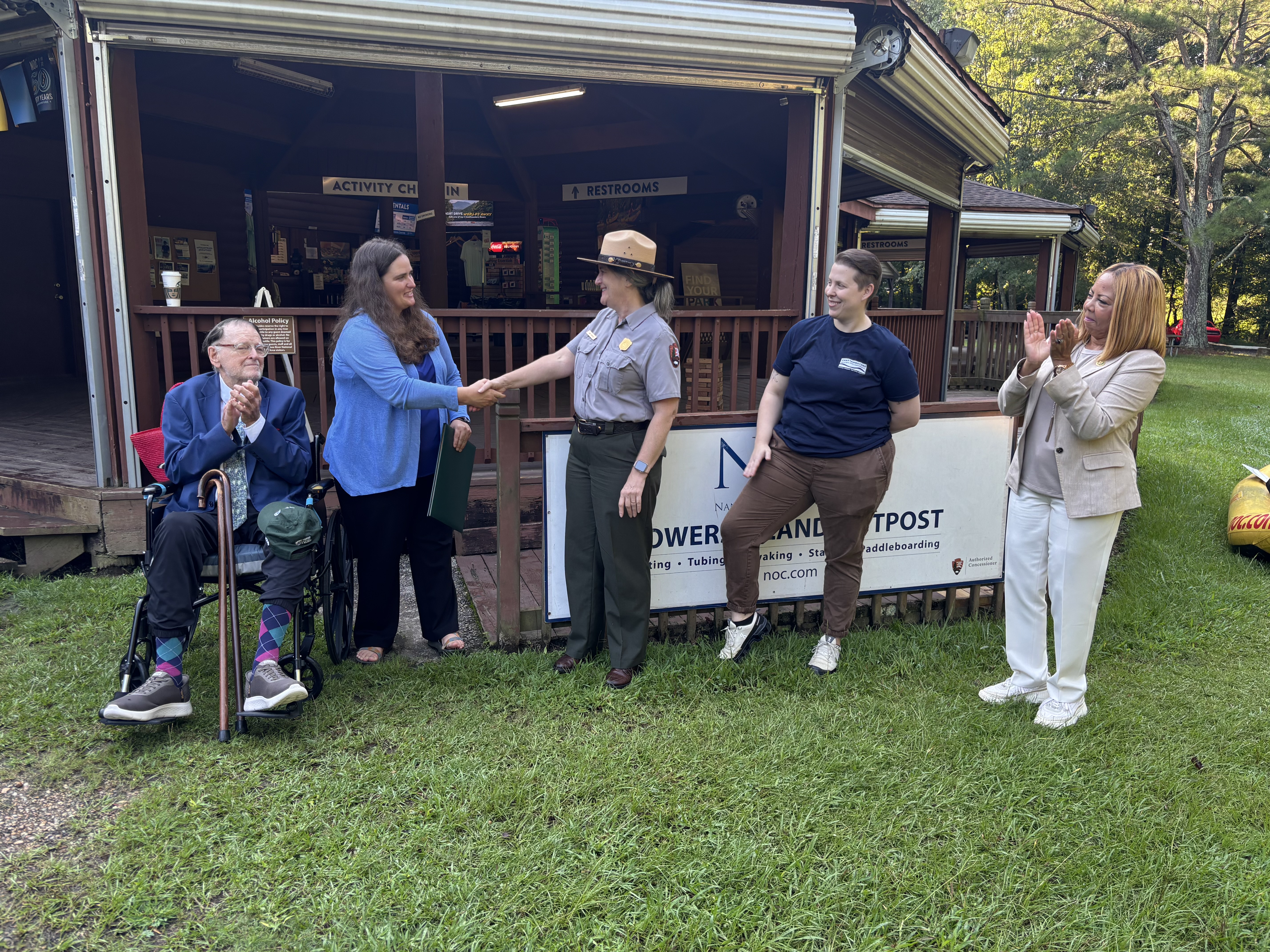 Four-photo collage of Rep. McBath visiting senior groups and nonprofit organizations.
