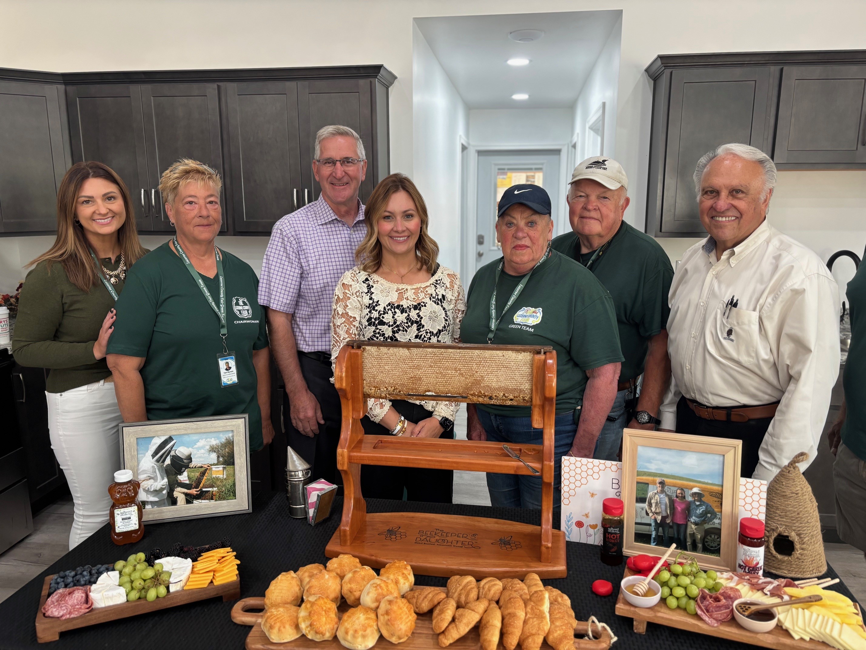 A picture of Rep. Pashinski and Sec. Redding with Luzerne County Fair volunteers and board members.