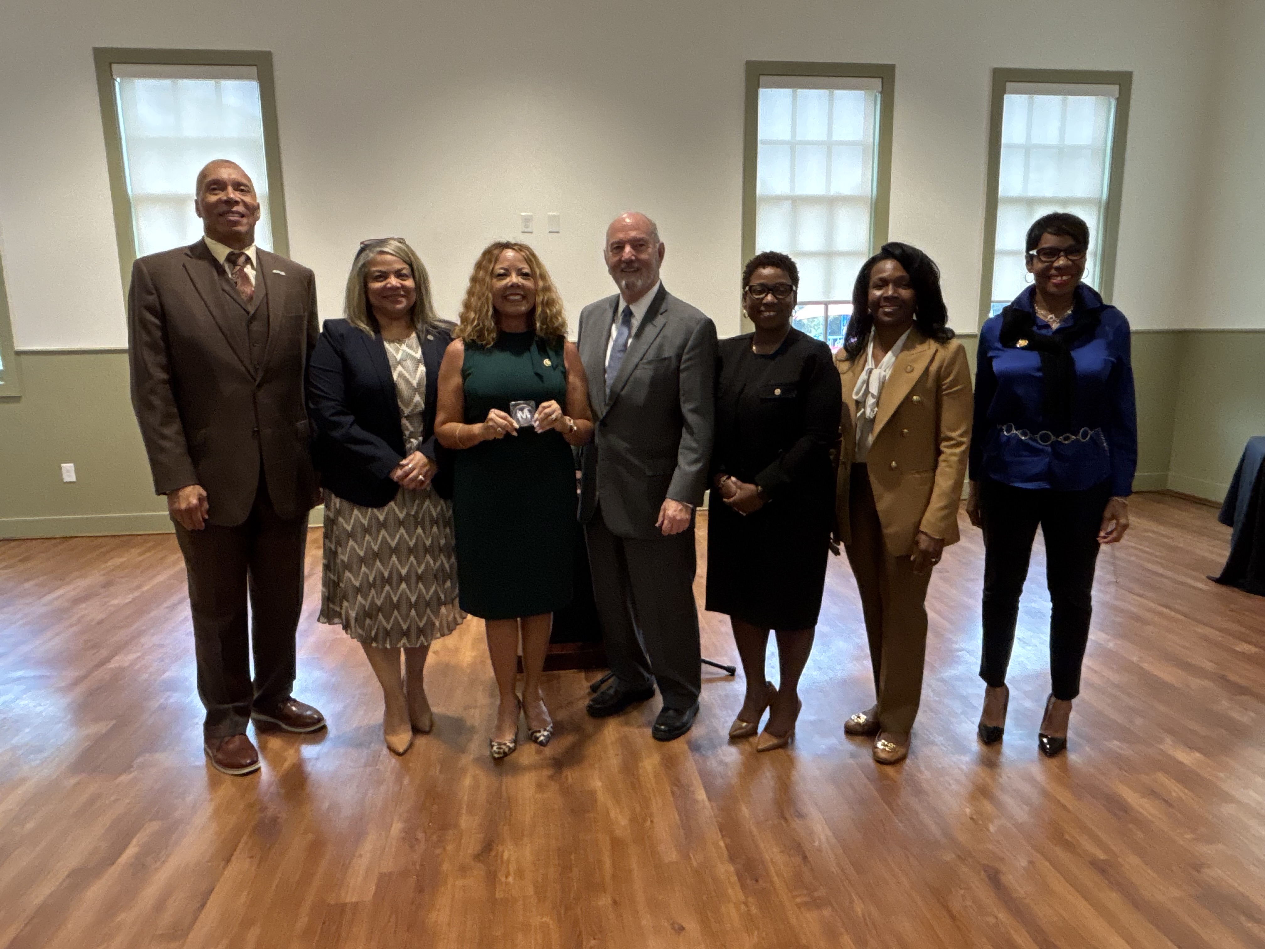 Rep. McBath (third from left) stands with Cobb County elected officials and advocates from Marsy's Law for Georgia.
