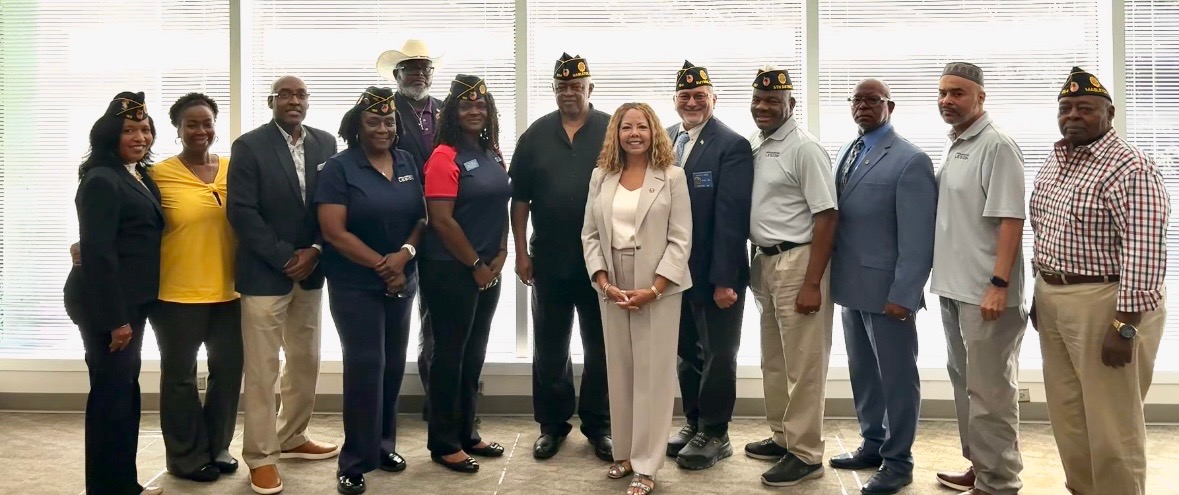 Rep. McBath stands in the center with leaders from American Legion posts and veterans in Georgia's Sixth District.