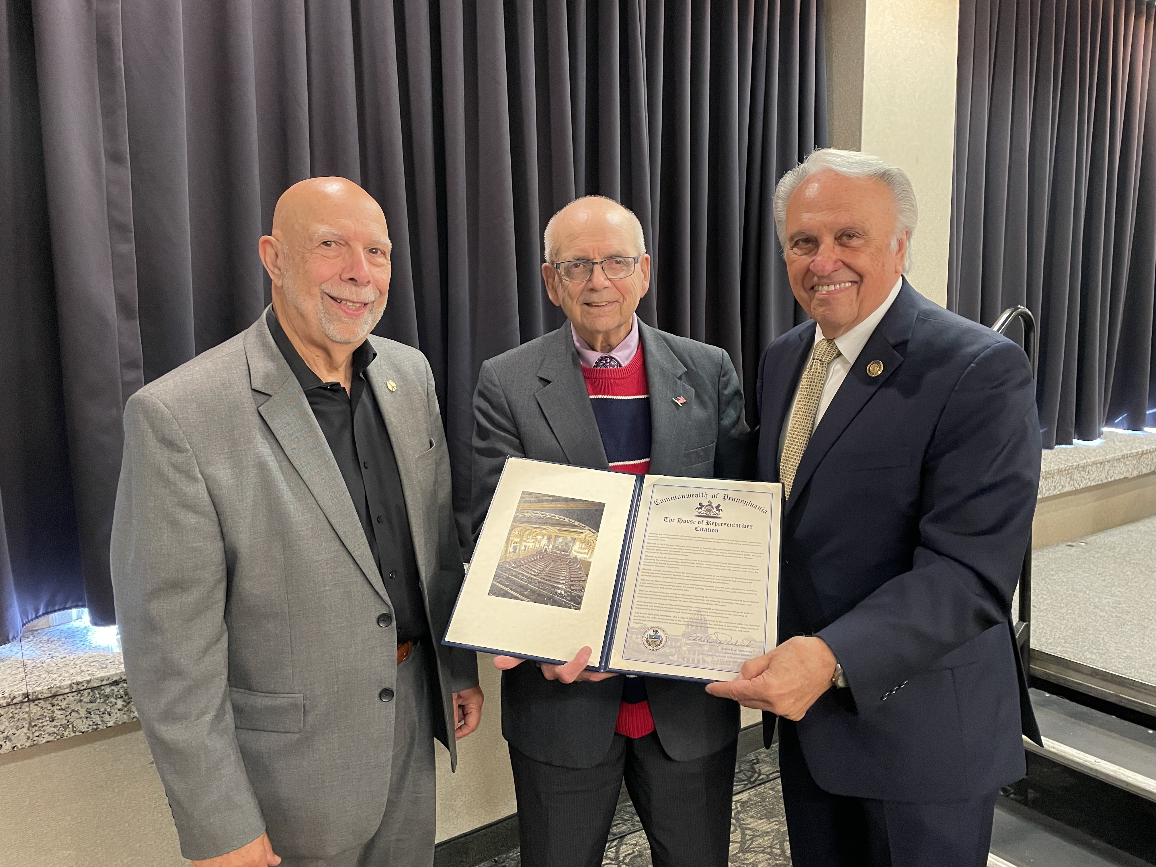 Rep. Pashinski poses with Howard Grossman and Frank Mariano with the citation for Howard.