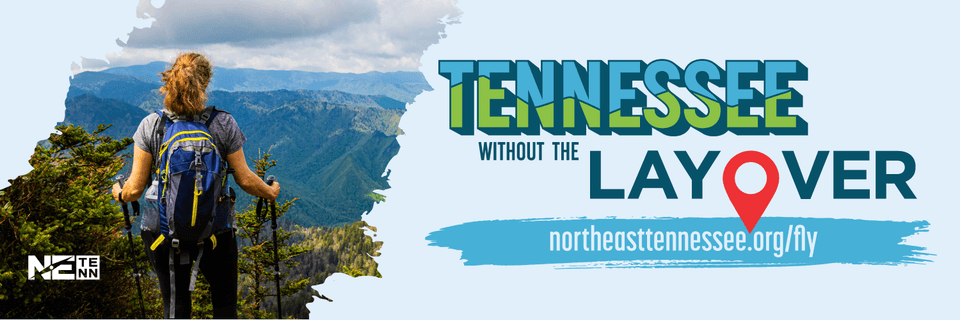 Promotional banner featuring a person with a backpack overlooking a lush mountain vista, with text 'Tennessee Without The Layover' and a website URL 'northeasttennessee.org/fly'.